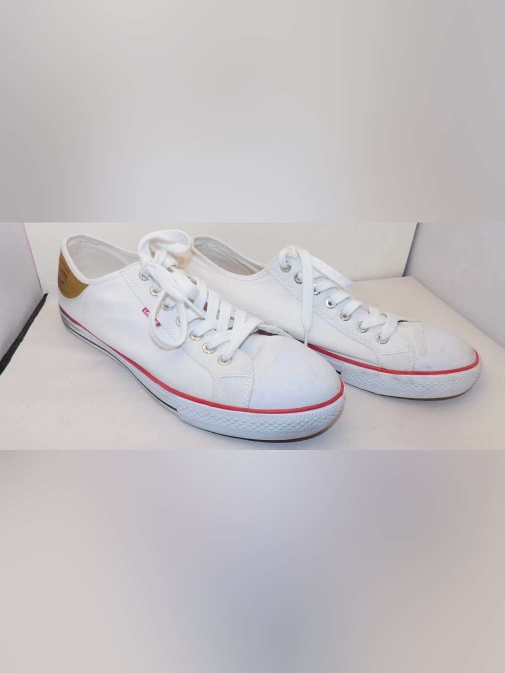 Levi's White Low-Top Sneakers with Red Stripe and Tan Heel Patch